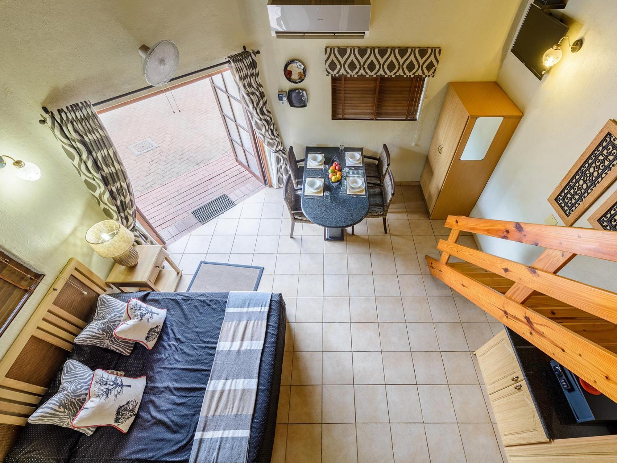 Dikhololo Apartment Brits Bilik gambar