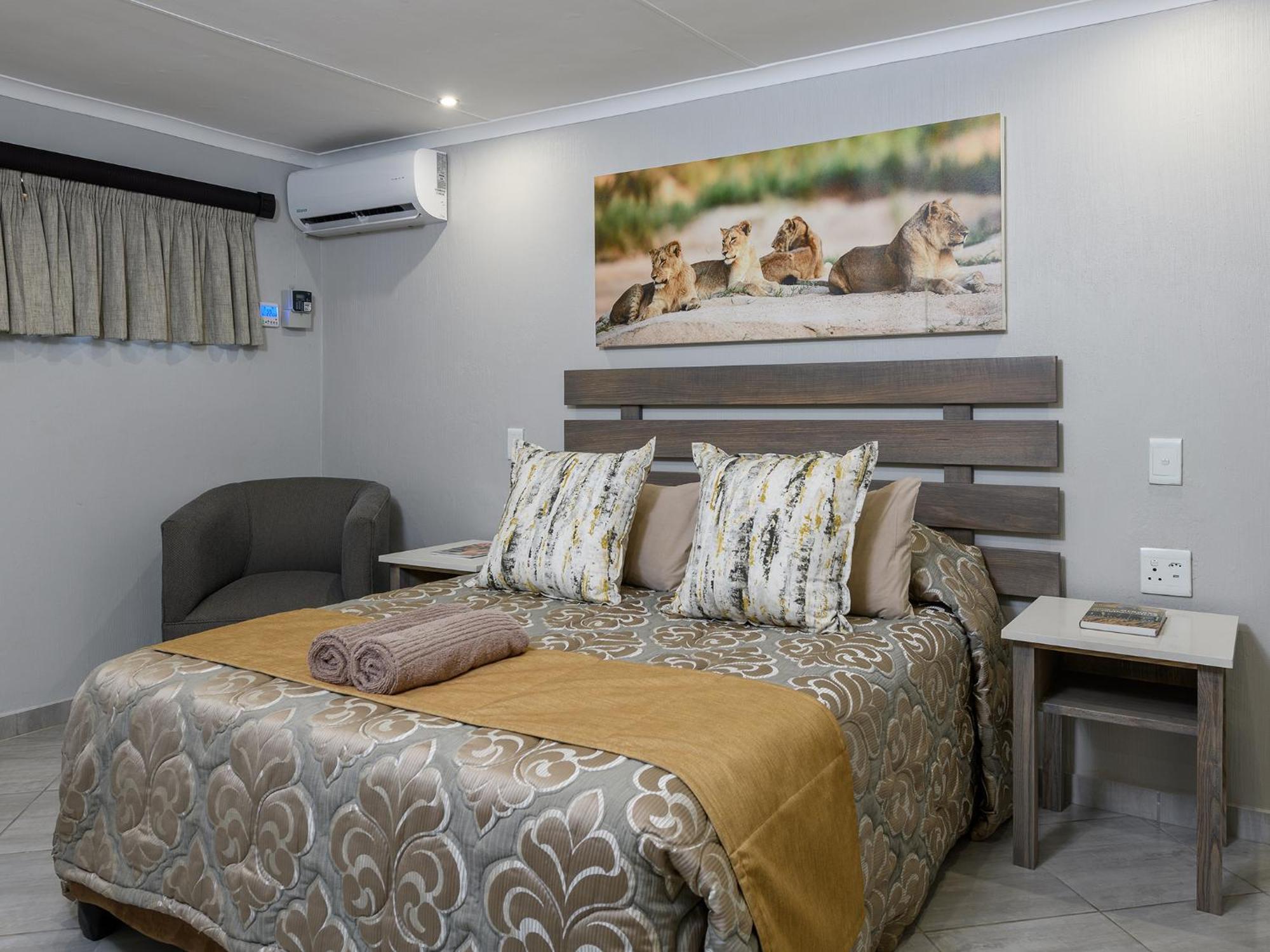 Dikhololo Apartment Brits Bilik gambar